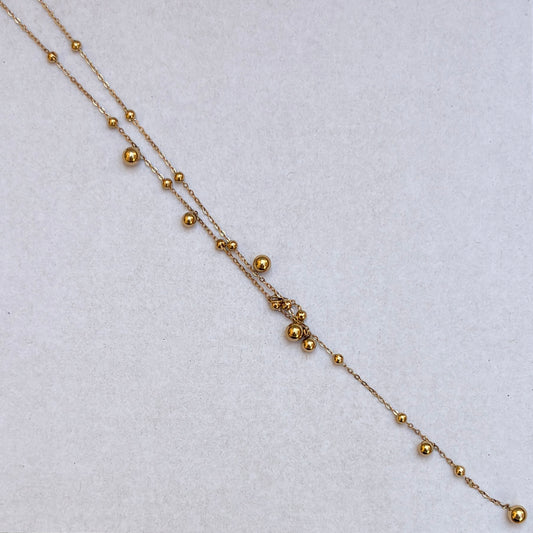 Collar Bolas Doradas