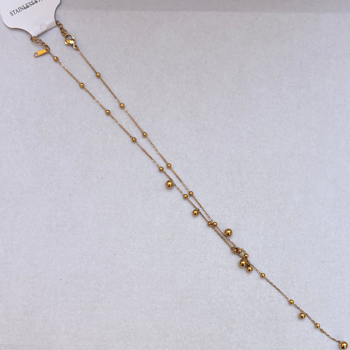 Collar Bolas Doradas