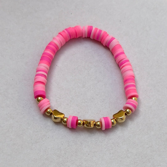 Pulsera rosa con corazones